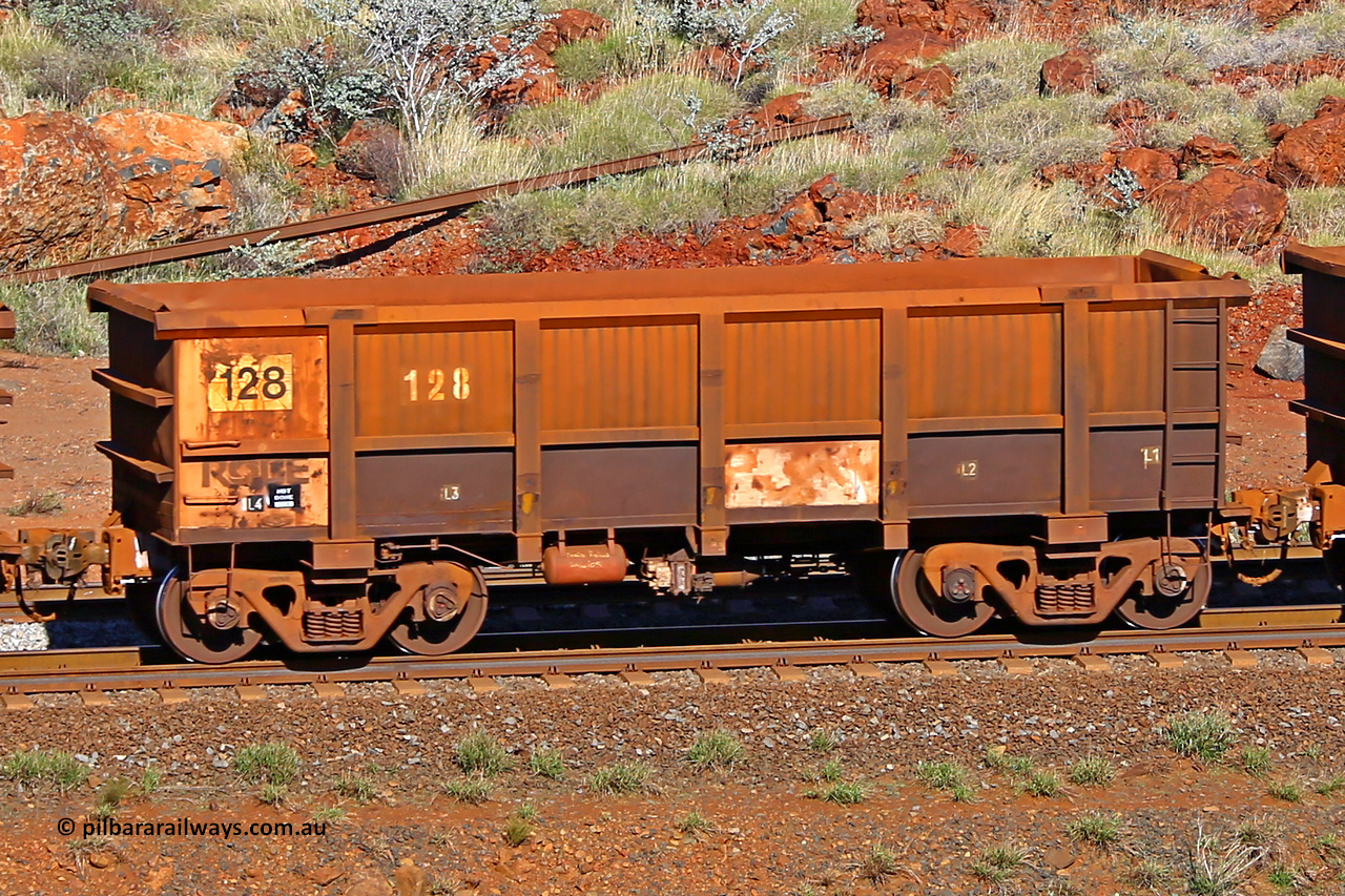 0128 180616 1701
Robe River ore waggon 128, built by Nippon Sharyo Nihon, rotary coupler end non-handbrake side empty view at the 38 km, Harding on the Cape Lambert line, June 16, 2018.
Keywords: 128;Nippon-Sharyo-Nihon;Robe-ore-waggon;
