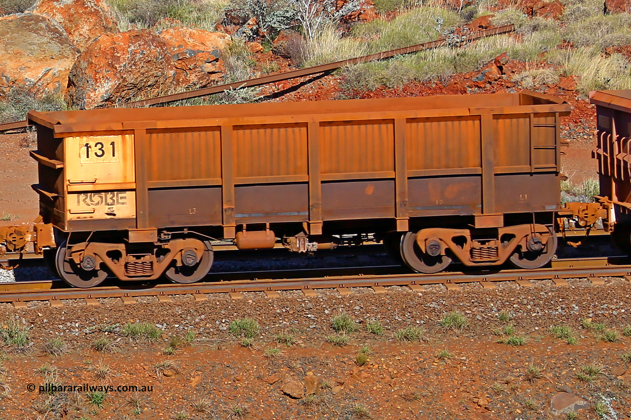 0131 180616 1738
Robe River ore waggon 131, built by Nippon Sharyo Nihon, rotary coupler end non-handbrake side empty view at the 38 km, Harding on the Cape Lambert line, June 16, 2018.
Keywords: 131;Nippon-Sharyo-Nihon;Robe-ore-waggon;