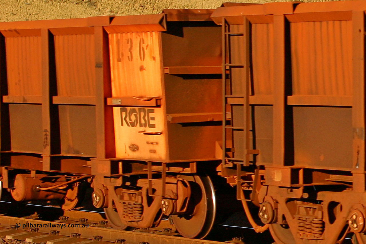 0136 060722 7623
Robe River ore waggon 136, built by Nippon Sharyo Nihon, rotary coupler end and plate view, empty, at the 11.7 km, Cape Lambert. July 22, 2006.
Keywords: 136;Nippon-Sharyo-Nihon;Robe-ore-waggon;