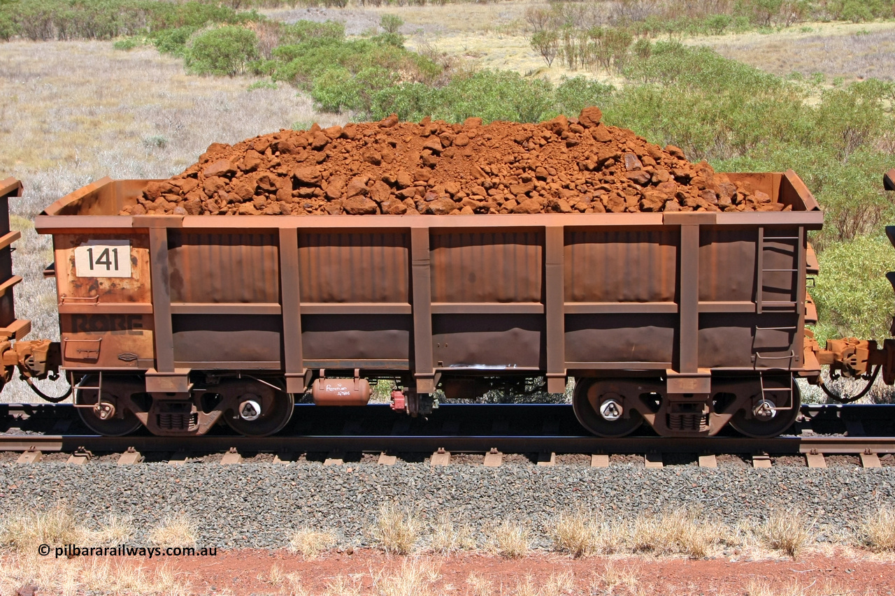 0141 081209 0138
Robe River ore waggon 141, built by Nippon Sharyo Nihon, non-handbrake side loaded view at the 7 km location just south of Cape Lambert yard. December 9, 2008.
Keywords: 141;Nippon-Sharyo-Nihon;Robe-ore-waggon;