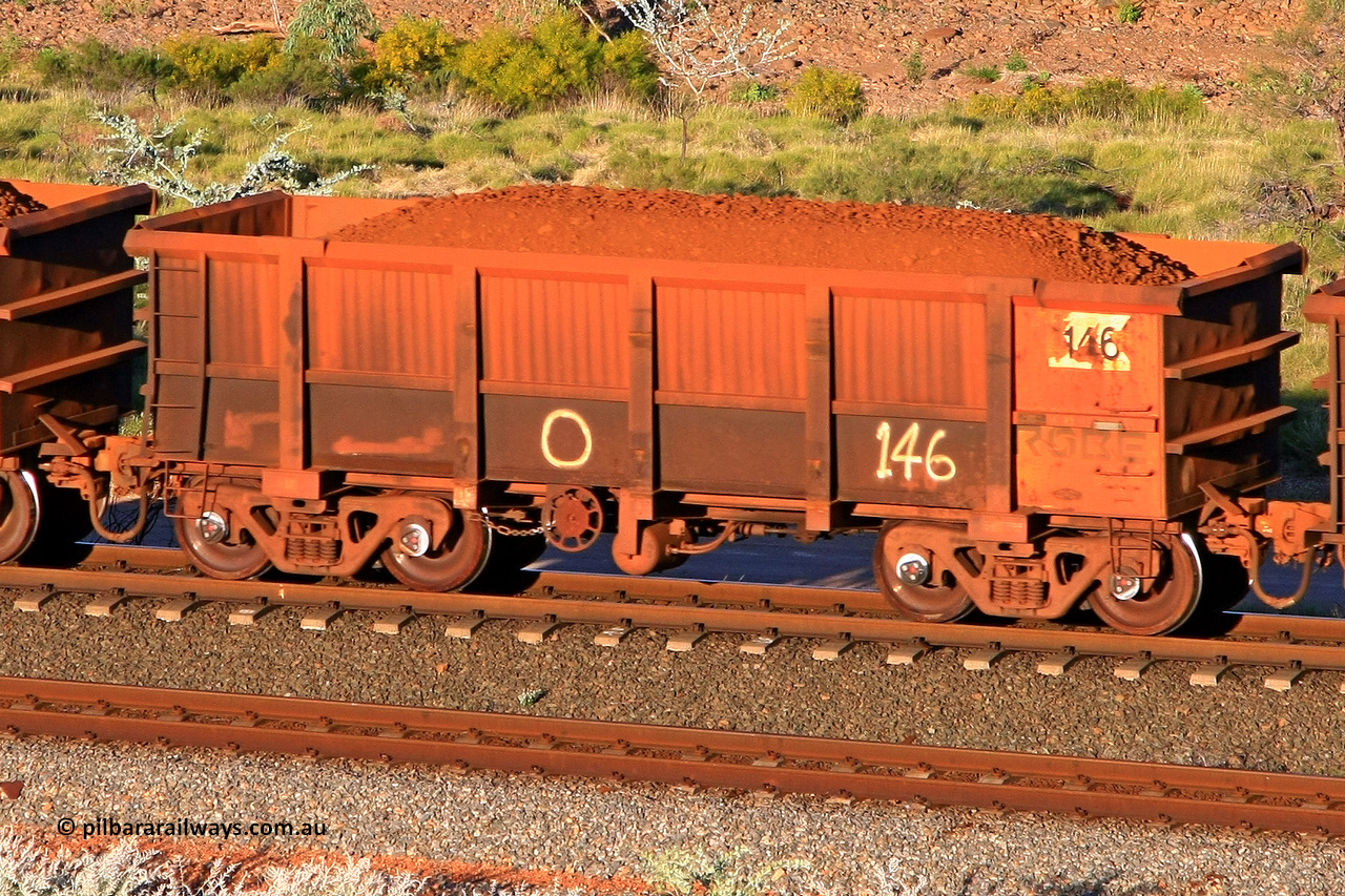 0146 110602 1744
Robe River ore waggon 146, built by Nippon Sharyo Nihon, rotary coupler end handbrake side loaded view at the 71 km, Western Creek on the Deepdale line. June 2, 2011.
Keywords: 146;Nippon-Sharyo-Nihon;Robe-ore-waggon;