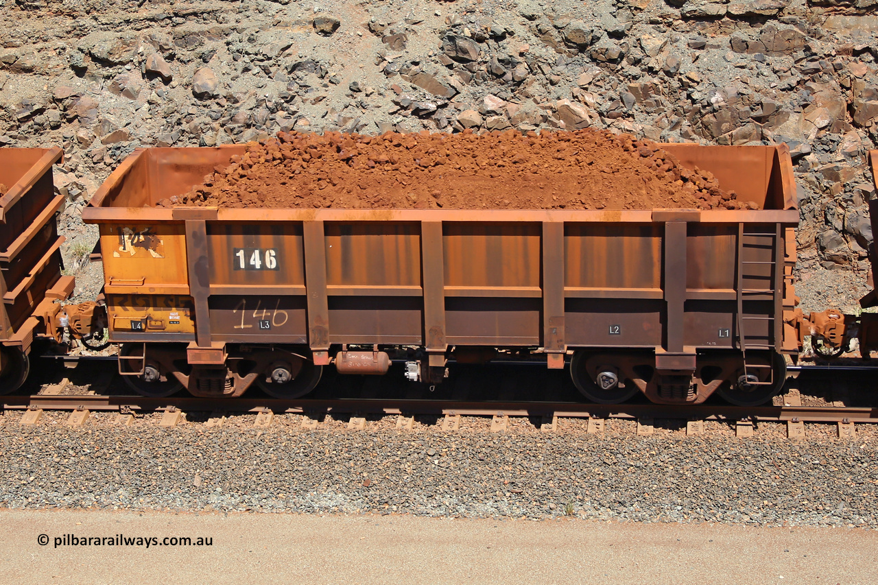 0146 160306 1516
Robe River ore waggon 146, built by Nippon Sharyo Nihon, fixed coupler non-handbrake side loaded view, shows Centurion Industries waybill holder, suspected waggon repair, at the 45 km, Harding Siding on the Cape Lambert line. March 6, 2016.
Keywords: 146;Nippon-Sharyo-Nihon;Robe-ore-waggon;
