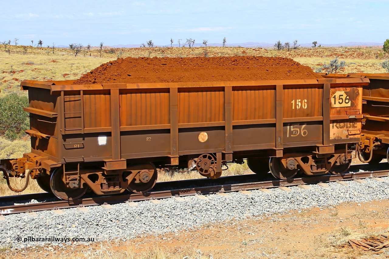 0156 170729 0229
Robe River ore waggon 156, built by Nippon Sharyo Nihon, fixed coupler handbrake side loaded view at the 103 km, between Maitland Siding and the Fortescue River on the Deepdale line. July 29, 2017.
Keywords: 156;Nippon-Sharyo-Nihon;Robe-ore-waggon;