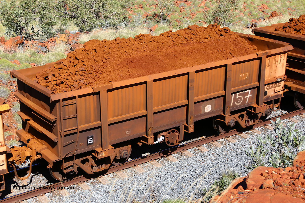 0157 180616 1867
Robe River ore waggon 157, built by Nippon Sharyo Nihon, fixed coupler handbrake side loaded view at Maitland Siding on the Deepdale line, June 16, 2018.
Keywords: 157;Nippon-Sharyo-Nihon;Robe-ore-waggon;