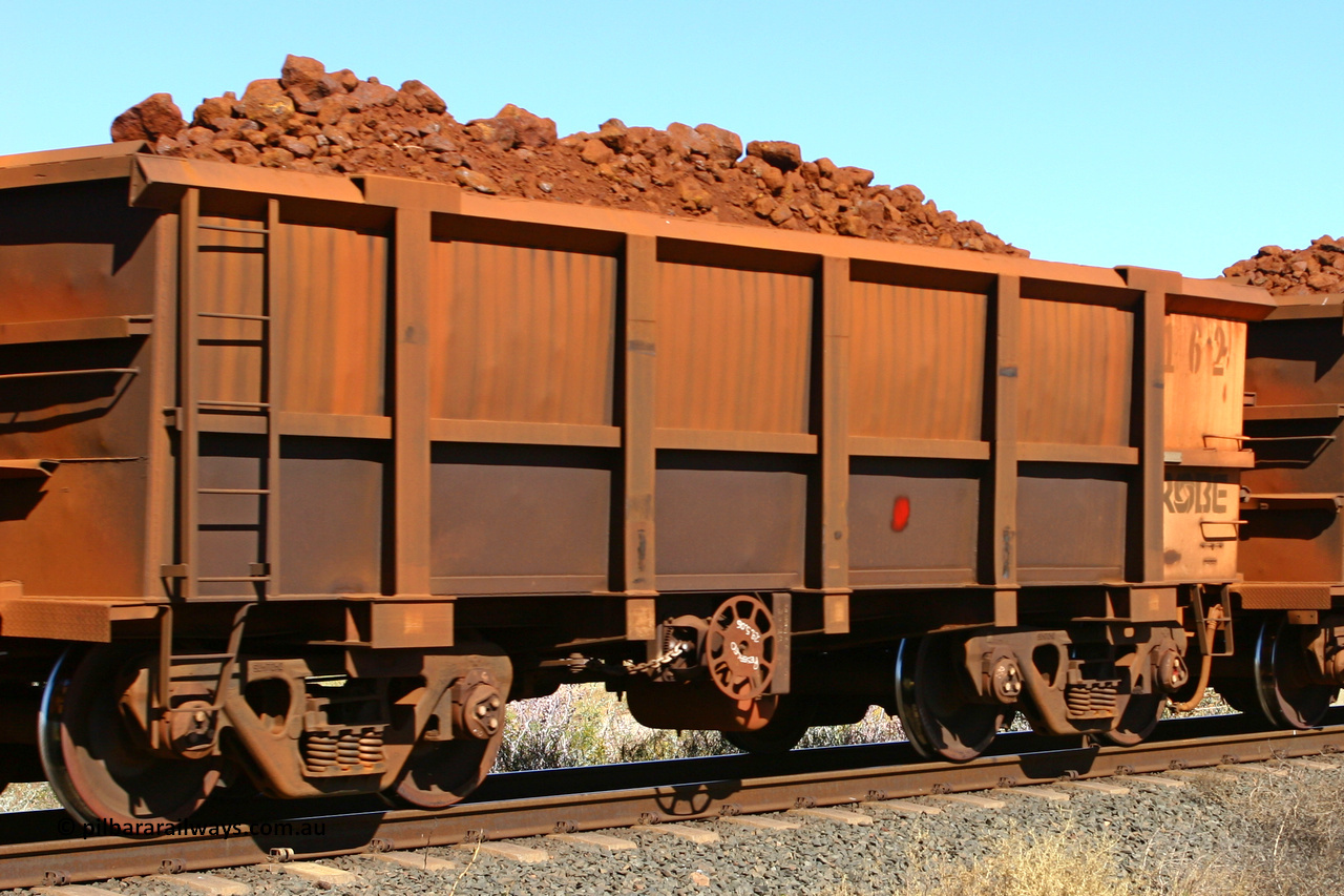 0162 060716 7198
Robe River ore waggon 162, built by Nippon Sharyo Nihon, fixed coupler end handbrake side loaded. Western Creek, July 16, 2006.
Keywords: 162;Nippon-Sharyo-Nihon;Robe-ore-waggon;