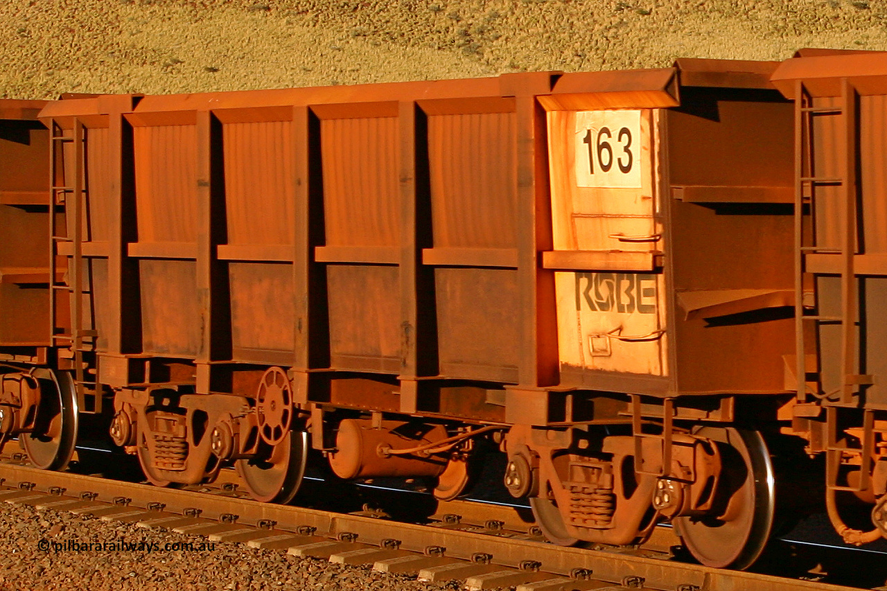 0163 060722 7606
Robe River ore waggon 163, built by Nippon Sharyo Nihon, rotary coupler end handbrake side empty view, panel repair with Centurion Industries waybill holder, at the 11.7 km, Cape Lambert. July 22, 2006.
Keywords: 163;Nippon-Sharyo-Nihon;Robe-ore-waggon;