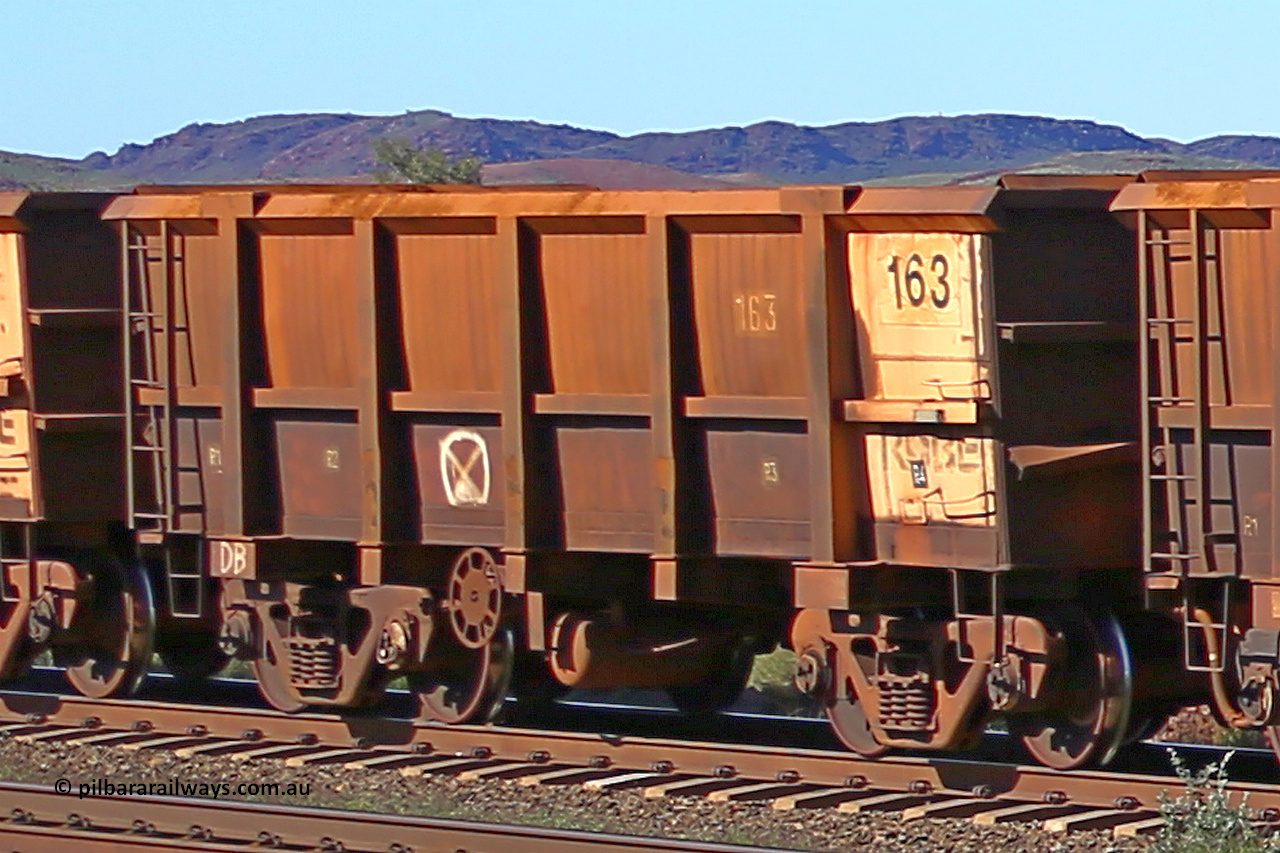 0163 160727 0960
Robe River ore waggon 163, built by Nippon Sharyo Nihon, rotary coupler end handbrake side empty view, panel repair with Centurion Industries waybill holder, at Harding Siding on the Cape Lambert line, July 27, 2016.
Keywords: 163;Nippon-Sharyo-Nihon;Robe-ore-waggon;