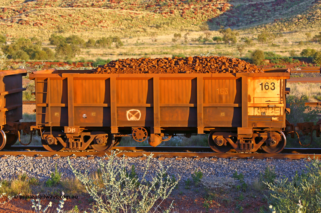 0163 170513 8732
Robe River ore waggon 163, built by Nippon Sharyo Nihon, handbrake side loaded view, panel repair with Centurion Industries waybill holder,  Cape Lambert yard, May 13, 2017.
Keywords: 163;Nippon-Sharyo-Nihon;Robe-ore-waggon;