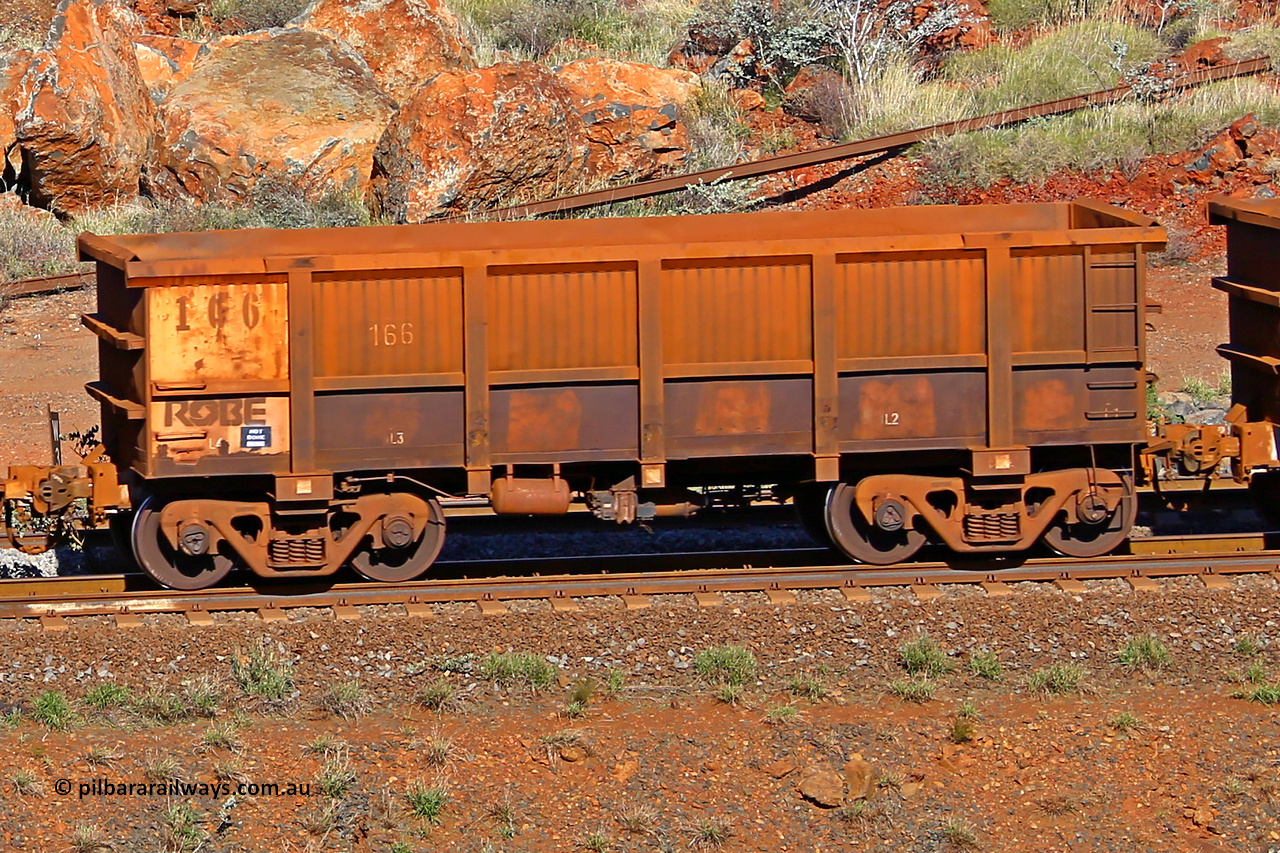 0166 180616 1740
Robe River ore waggon 166, built by Nippon Sharyo Nihon, rotary coupler end non-handbrake side empty view at the 38 km, Harding on the Cape Lambert line, June 16, 2018.
Keywords: 166;Nippon-Sharyo-Nihon;Robe-ore-waggon;