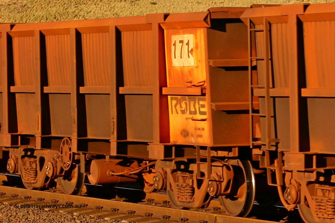 0171 060722 7595
Robe River ore waggon 171, built by Nippon Sharyo Nihon, rotary coupler end handbrake side empty, partial view, at the 11.7 km, Cape Lambert. July 22, 2006.
Keywords: 171;Nippon-Sharyo-Nihon;Robe-ore-waggon;