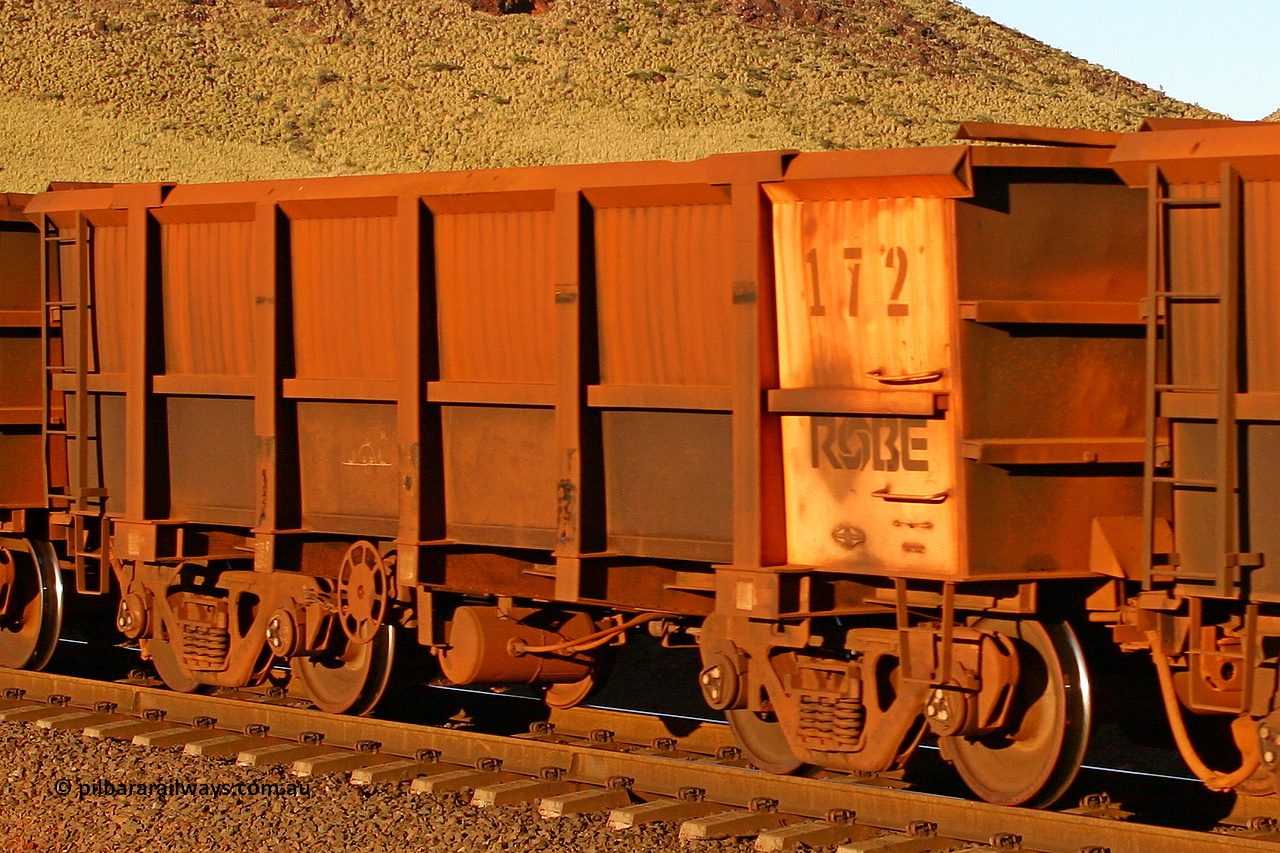 0172 060722 7614
Robe River ore waggon 172, built by Nippon Sharyo Nihon, rotary coupler end handbrake side empty view, at the 11.7 km, Cape Lambert. July 22, 2006.
Keywords: 172;Nippon-Sharyo-Nihon;Robe-ore-waggon;