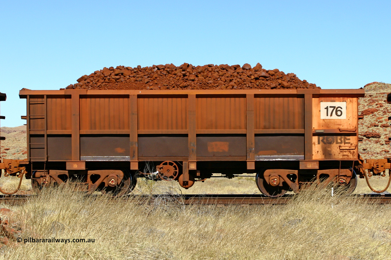 0176 060722 7517
Robe River ore waggon 176, built by Nippon Sharyo Nihon, handbrake side loaded view at the 78.8 km between Western Creek and Maitland on the Deepdale line. July 22, 2006.
Keywords: 176;Nippon-Sharyo-Nihon;Robe-ore-waggon;