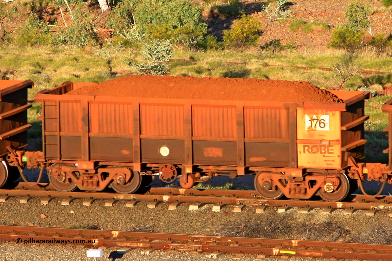 0176 110602 1653
Robe River ore waggon 176, built by Nippon Sharyo Nihon, rotary coupler end handbrake side loaded view at the 71 km, Western Creek on the Deepdale line. June 2, 2011.
Keywords: 176;Nippon-Sharyo-Nihon;Robe-ore-waggon;
