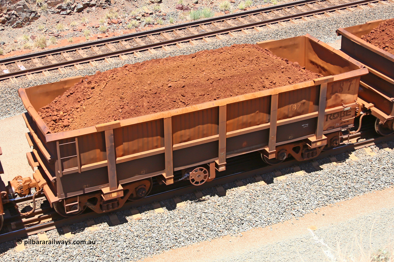 0187 160306 1462
Robe River ore waggon 187, built by Nippon Sharyo Nihon, fixed coupler handbrake side loaded view at the 45 km, Harding Siding on the Cape Lambert line. March 6, 2016.
Keywords: 187;Nippon-Sharyo-Nihon;Robe-ore-waggon;