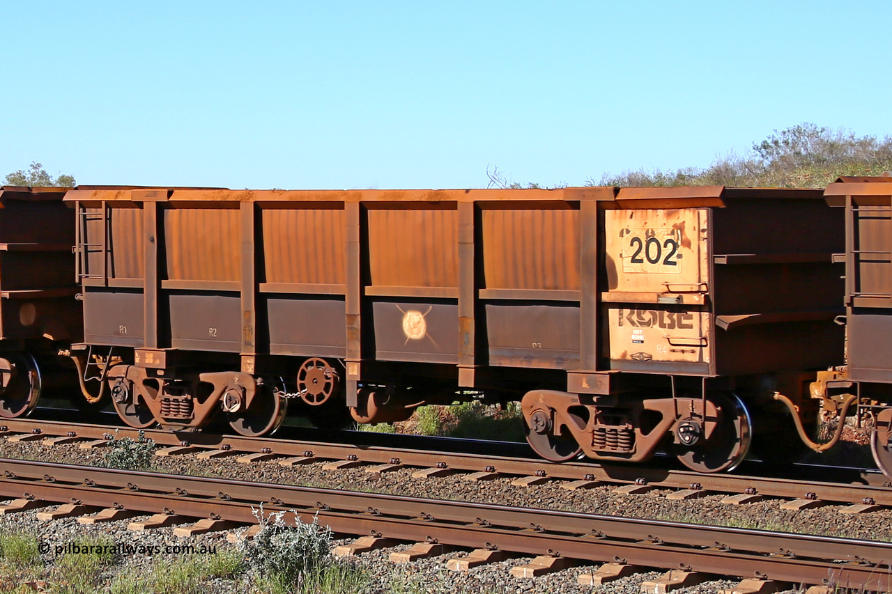 0202 160727 0974
Robe River ore waggon 202, built by Nippon Sharyo Nihon, rotary coupler end handbrake side empty view at Harding Siding on the Cape Lambert line, July 27, 2016.
Keywords: 202;Nippon-Sharyo-Nihon;Robe-ore-waggon;