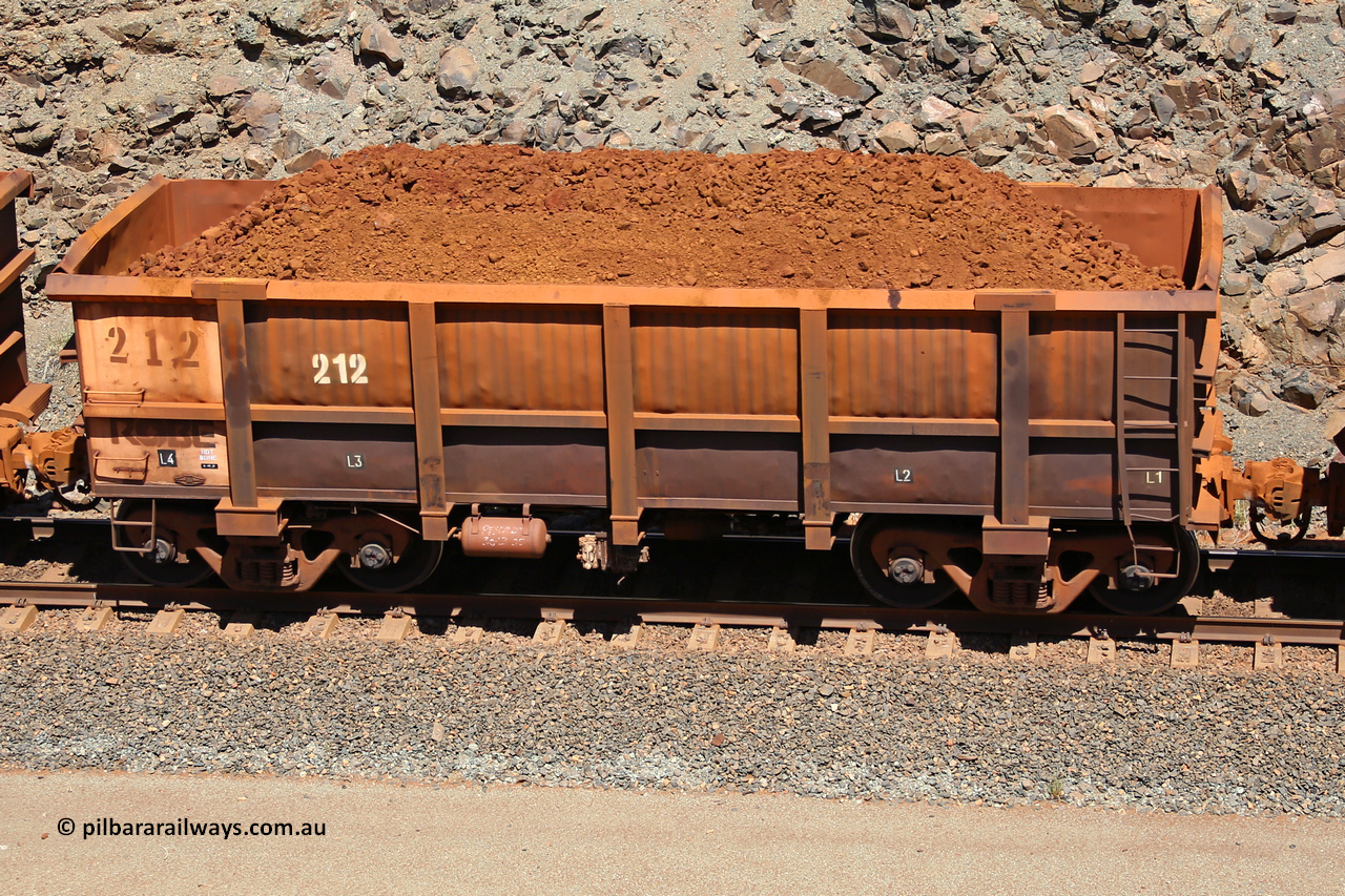 0212 160306 1529
Robe River ore waggon 212, built by Nippon Sharyo Nihon, fixed coupler non-handbrake side loaded view at the 45 km, Harding Siding on the Cape Lambert line. March 6, 2016.
Keywords: 212;Nippon-Sharyo-Nihon;Robe-ore-waggon;
