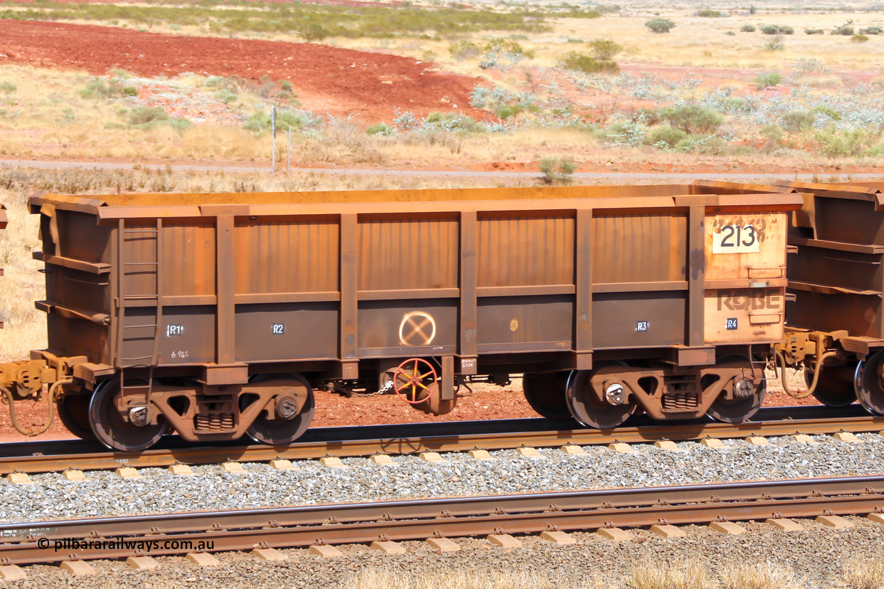 0213 141124 6803
Robe River ore waggon 213, built by Nippon Sharyo Nihon, fixed coupler handbrake side empty view at the 25 km at Arches Siding on the Cape Lambert line. November 24, 2014.
Keywords: 213;Nippon-Sharyo-Nihon;Robe-ore-waggon;