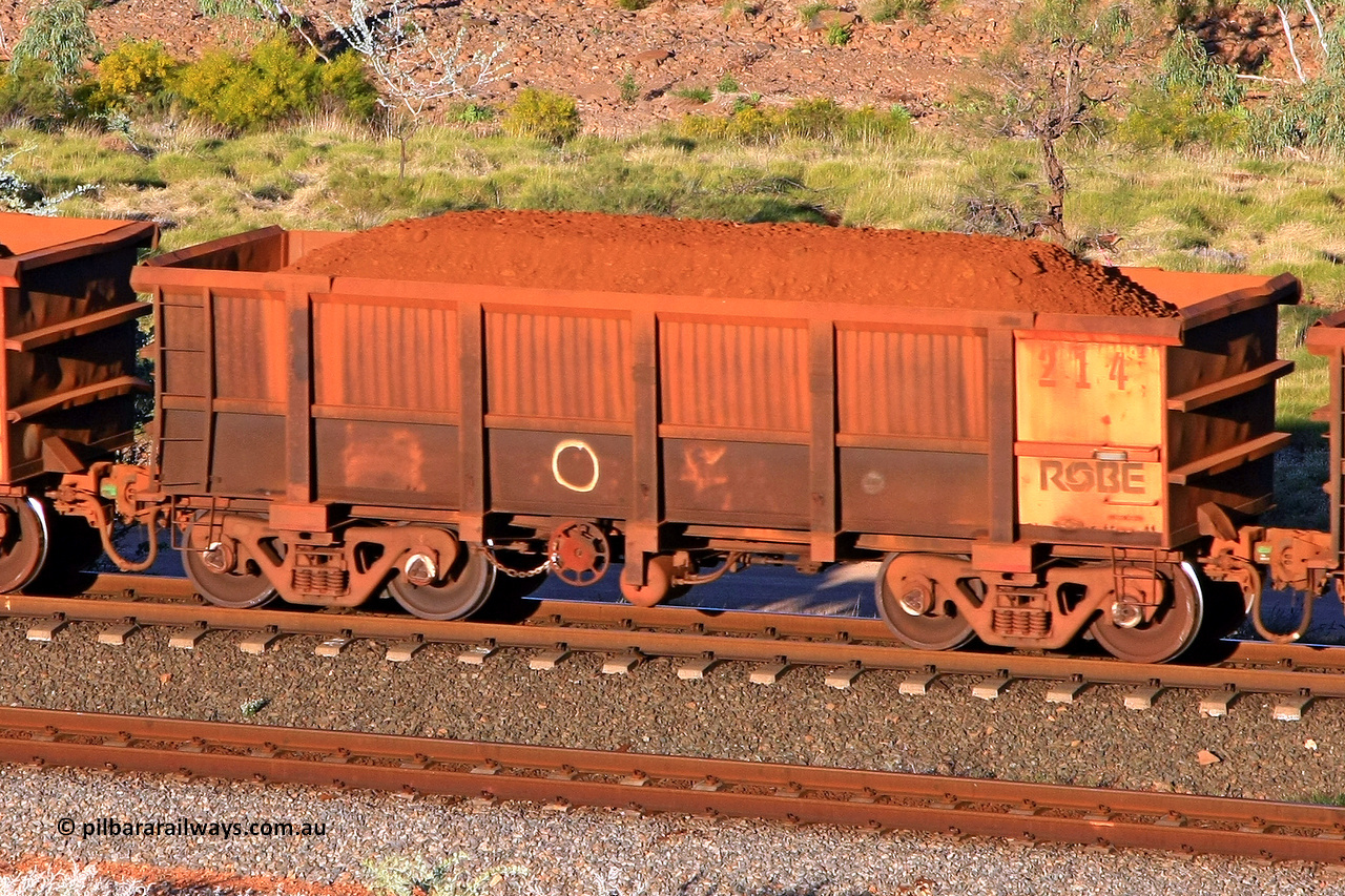 0214 110602 1690
Robe River ore waggon 214, built by Nippon Sharyo Nihon, rotary coupler end handbrake side loaded view at the 71 km, Western Creek on the Deepdale line. June 2, 2011.
Keywords: 214;Nippon-Sharyo-Nihon;Robe-ore-waggon;