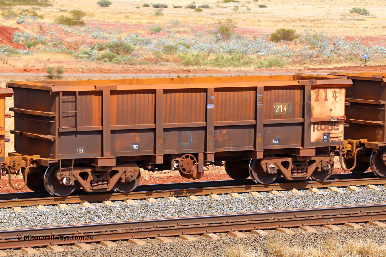0214 141124 6778
Robe River ore waggon 214, built by Nippon Sharyo Nihon, fixed coupler handbrake side empty view at the 25 km at Arches Siding on the Cape Lambert line. November 24, 2014.
Keywords: 214;Nippon-Sharyo-Nihon;Robe-ore-waggon;
