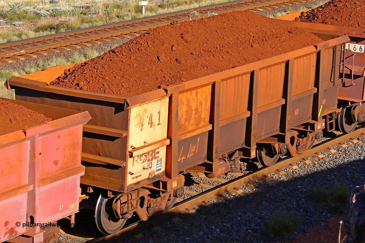 0441 210322 9724
Robe River ore waggon 441, built by Tomlinson Steel WA, rotary coupler end non-handbrake side loaded view at the 17 km on the Cape Lambert line, March 22, 2021.
Keywords: 441;Tomlinson-Steel-WA;Robe-ore-waggon;