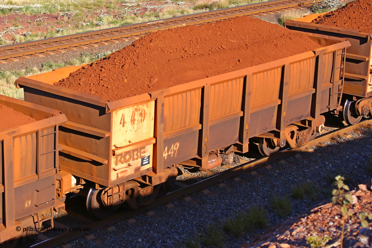0449 210322 9688
Robe River ore waggon 449, built by Tomlinson Steel WA, rotary coupler end non-handbrake side loaded view at the 17 km on the Cape Lambert line, March 22, 2021.
Keywords: 449;Tomlinson-Steel-WA;Robe-ore-waggon;