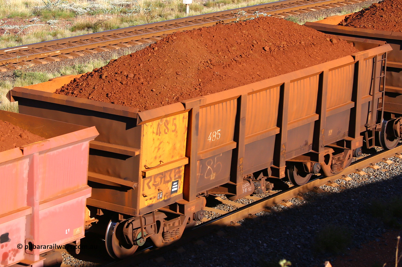 0485 210322 9740
Robe River ore waggon 485, built by Tomlinson Steel WA, rotary coupler end non-handbrake side loaded view at the 17 km on the Cape Lambert line, March 22, 2021.
Keywords: 485;Tomlinson-Steel-WA;Robe-ore-waggon;