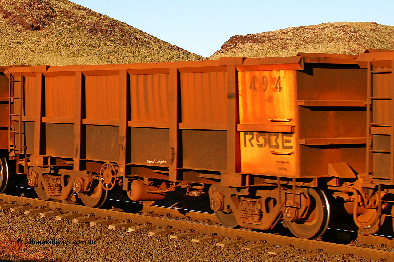 0494 060722 7610
Robe River ore waggon 494, built by Tomlinson Steel WA, rotary coupler end handbrake side empty view, at the 11.7 km, Cape Lambert. July 22, 2006.
Keywords: 494;Tomlinson-Steel-WA;Robe-ore-waggon;