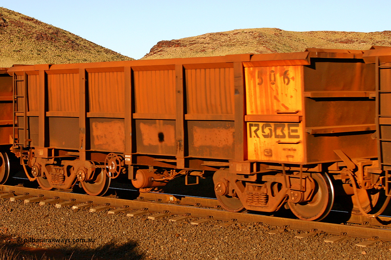 0506 060722 7623
Robe River ore waggon 506, built by Tomlinson Steel WA, rotary coupler end handbrake side empty view, at the 11.7 km, Cape Lambert. July 22, 2006.
Keywords: 506;Tomlinson-Steel-WA;Robe-ore-waggon;