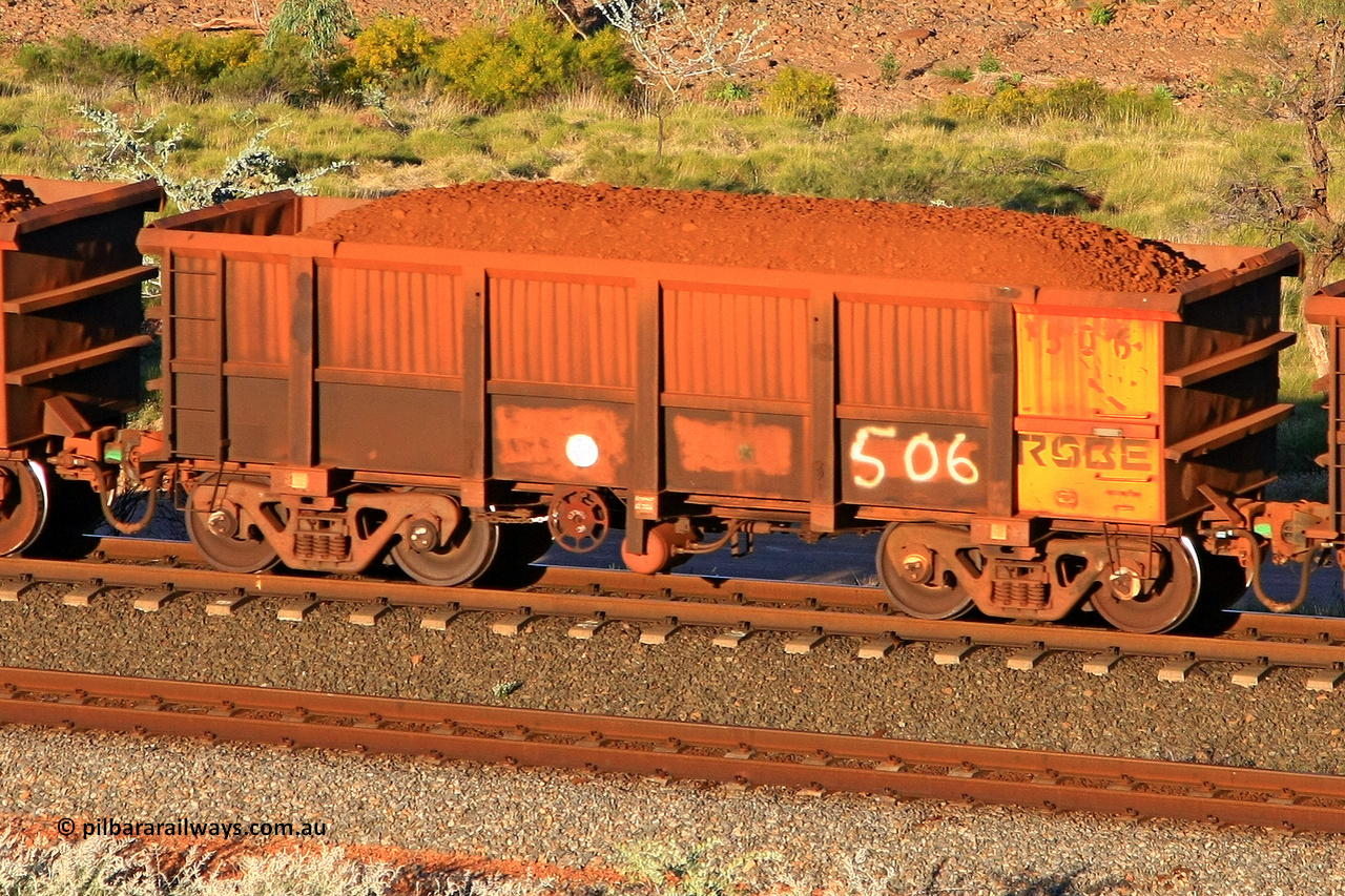 0506 110602 1723
Robe River ore waggon 506, built by Tomlinson Steel WA, rotary coupler end handbrake side loaded view at the 71 km, Western Creek on the Deepdale line. June 2, 2011.
Keywords: 506;Tomlinson-Steel-WA;Robe-ore-waggon;