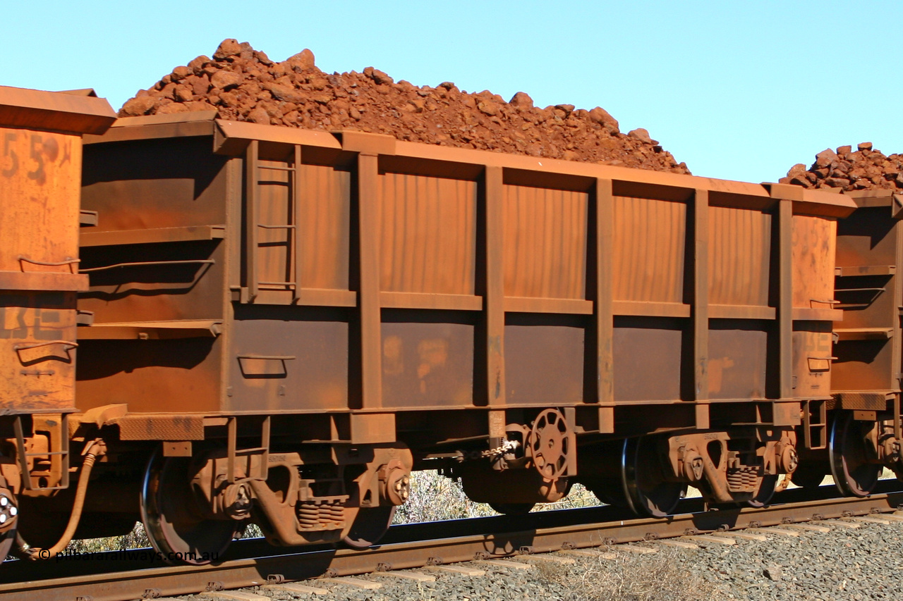 0515 060716 7189
Robe River ore waggon 515, built by Tomlinson Steel WA, fixed coupler end handbrake side loaded. Western Creek, July 16, 2006.
Keywords: 515;Tomlinson-Steel-WA;Robe-ore-waggon;
