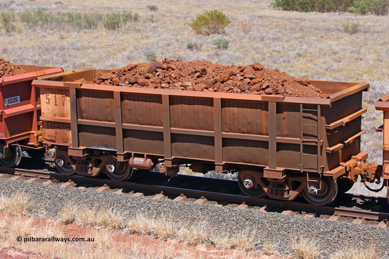 0517 081209 0164
Robe River ore waggon 517, built by Tomlinson Steel WA, fixed coupler non-handbrake side loaded view at the 7 km location just south of Cape Lambert yard. December 9, 2008.
Keywords: 517;Tomlinson-Steel-WA;Robe-ore-waggon;