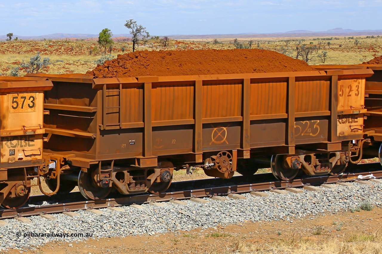 0523 170729 0275
Robe River ore waggon 523, built by Tomlinson Steel WA, fixed coupler handbrake side loaded view at the 103 km, between Maitland Siding and the Fortescue River on the Deepdale line. July 29, 2017.
Keywords: 523;Tomlinson-Steel-WA;Robe-ore-waggon;