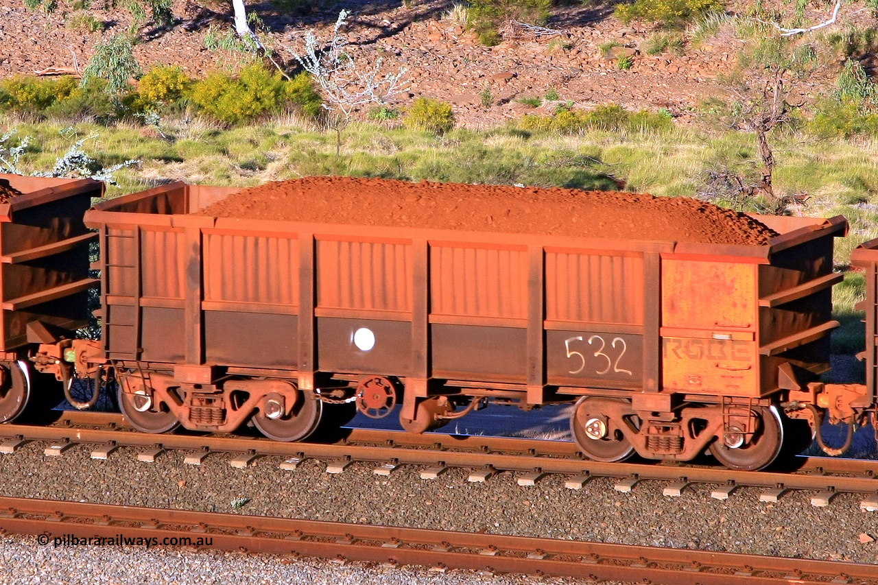 0532 110602 1717
Robe River ore waggon 532, built by Tomlinson Steel WA, rotary coupler end handbrake side loaded view at the 71 km, Western Creek on the Deepdale line. June 2, 2011.
Keywords: 532;Tomlinson-Steel-WA;Robe-ore-waggon;