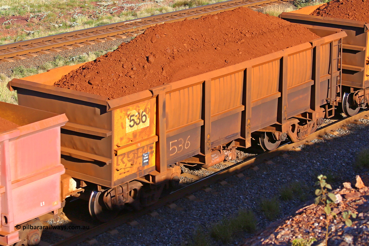 0536 210322 9683
Robe River ore waggon 536, built by Tomlinson Steel WA, rotary coupler end non-handbrake side loaded view at the 17 km on the Cape Lambert line, March 22, 2021.
Keywords: 536;Tomlinson-Steel-WA;Robe-ore-waggon;