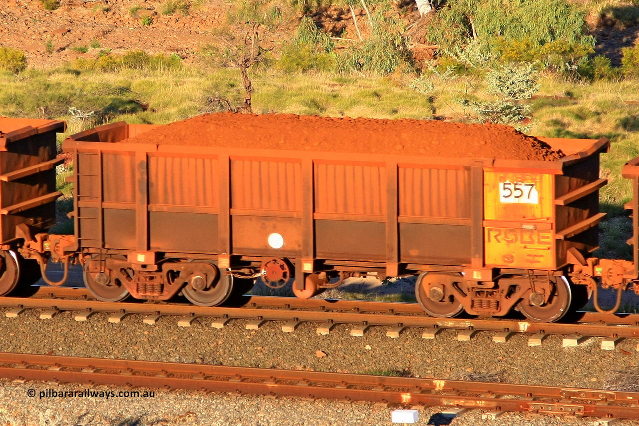 0557 110602 1678
Robe River ore waggon 557, built by Tomlinson Steel WA, rotary coupler end handbrake side loaded view at the 71 km, Western Creek on the Deepdale line. June 2, 2011.
Keywords: 557;Tomlinson-Steel-WA;Robe-ore-waggon;
