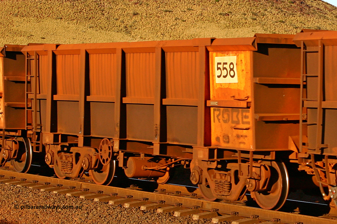 0558 060722 7611
Robe River ore waggon 558, built by Tomlinson Steel WA, rotary coupler end handbrake side empty view, at the 11.7 km, Cape Lambert. July 22, 2006.
Keywords: 558;Tomlinson-Steel-WA;Robe-ore-waggon;
