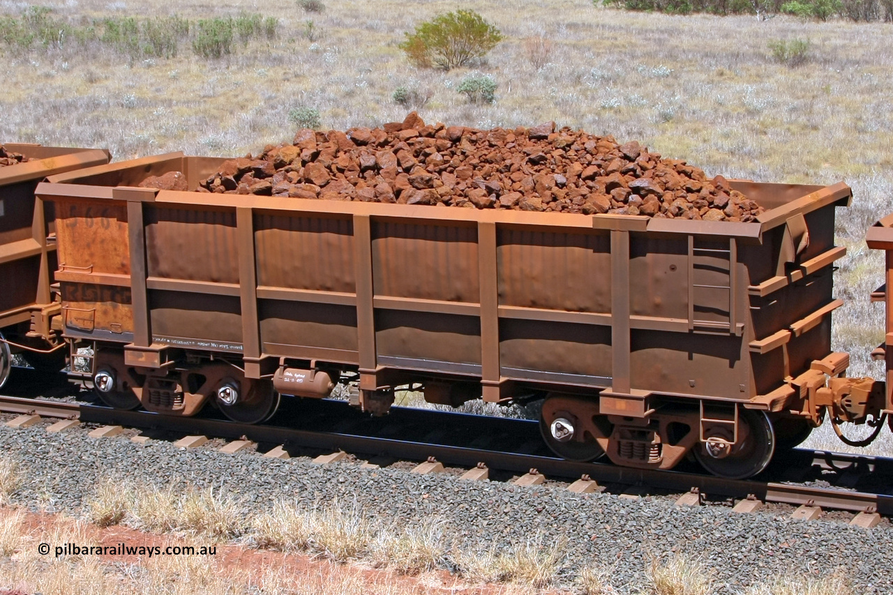 0566 081209 0156
Robe River ore waggon 566, built by Tomlinson Steel WA, fixed coupler non-handbrake side loaded view at the 7 km location just south of Cape Lambert yard. December 9, 2008.
Keywords: 566;Tomlinson-Steel-WA;Robe-ore-waggon;