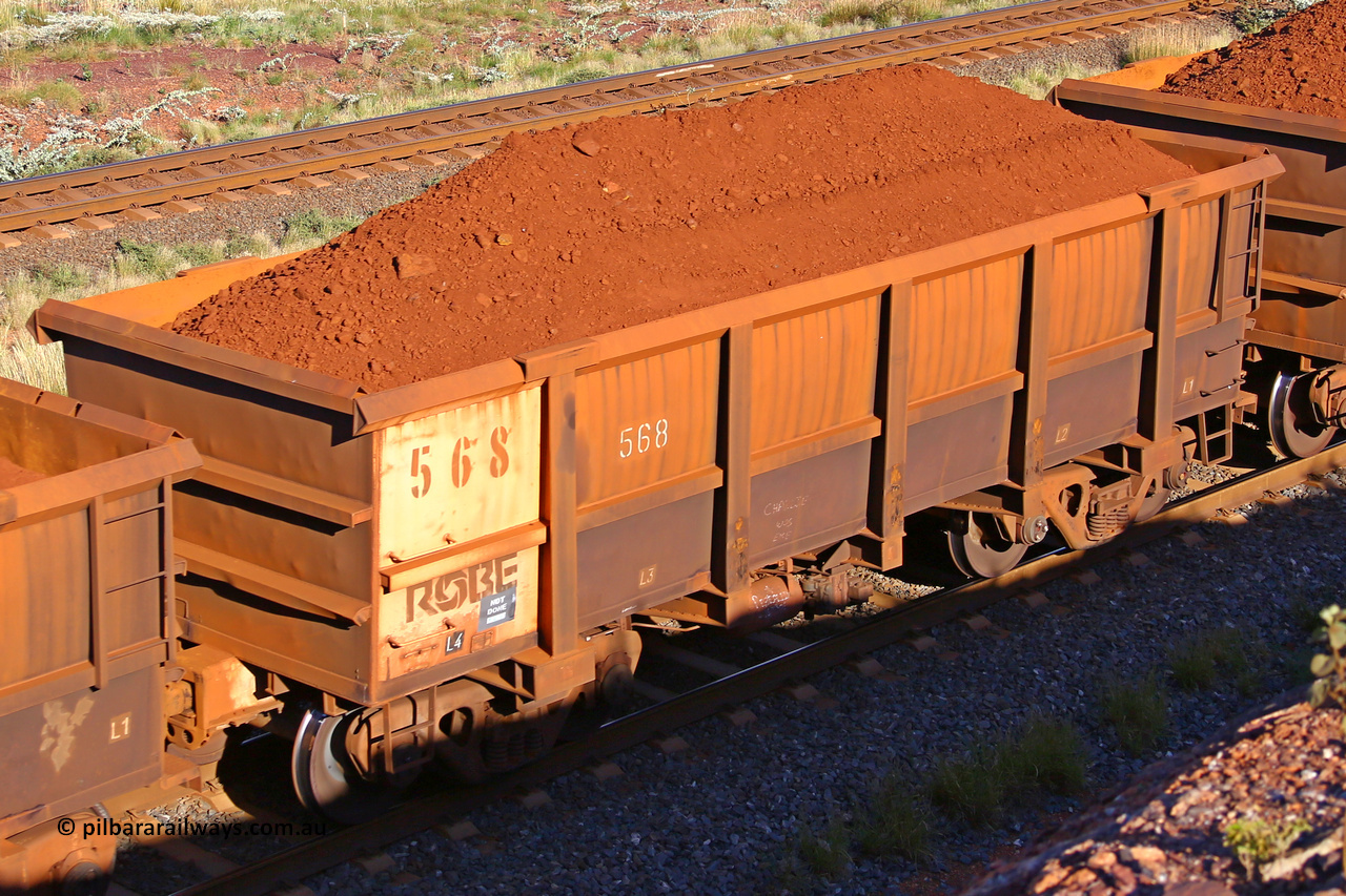 0568 210322 9687
Robe River ore waggon 568, built by Tomlinson Steel WA, rotary coupler end non-handbrake side loaded view at the 17 km on the Cape Lambert line, March 22, 2021.
Keywords: 568;Tomlinson-Steel-WA;Robe-ore-waggon;