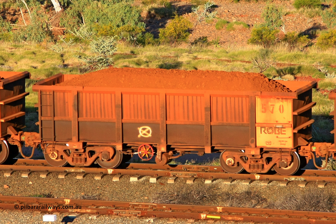 0570 110602 1667
Robe River ore waggon 570, built by Tomlinson Steel WA, rotary coupler end handbrake side loaded view at the 71 km, Western Creek on the Deepdale line. June 2, 2011.
Keywords: 570;Tomlinson-Steel-WA;Robe-ore-waggon;
