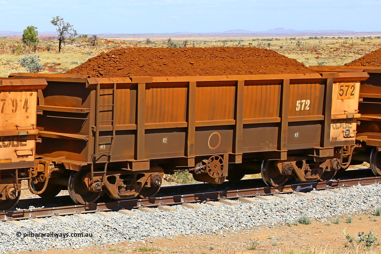 0572 170729 0211
Robe River ore waggon 572, built by Tomlinson Steel WA, fixed coupler handbrake side loaded view at the 103 km, between Maitland Siding and the Fortescue River on the Deepdale line. July 29, 2017.
Keywords: 572;Tomlinson-Steel-WA;Robe-ore-waggon;