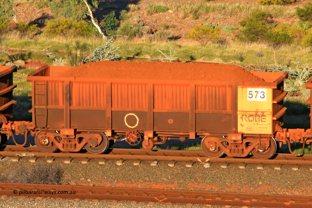0573 110602 1660
Robe River ore waggon 573, built by Tomlinson Steel WA, rotary coupler end handbrake side loaded view at the 71 km, Western Creek on the Deepdale line. June 2, 2011.
Keywords: 573;Tomlinson-Steel-WA;Robe-ore-waggon;