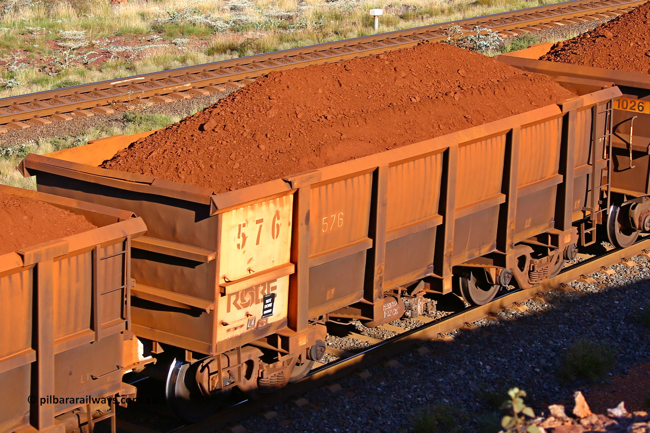 0576 210322 9714
Robe River ore waggon 576, built by Tomlinson Steel WA, rotary coupler end non-handbrake side loaded view at the 17 km on the Cape Lambert line, March 22, 2021.
Keywords: 576;Tomlinson-Steel-WA;Robe-ore-waggon;