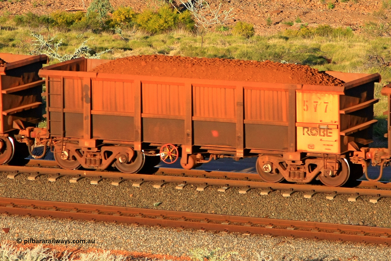 0577 110602 1735
Robe River ore waggon 577, built by Tomlinson Steel WA, rotary coupler end handbrake side loaded view at the 71 km, Western Creek on the Deepdale line. June 2, 2011.
Keywords: 577;Tomlinson-Steel-WA;Robe-ore-waggon;