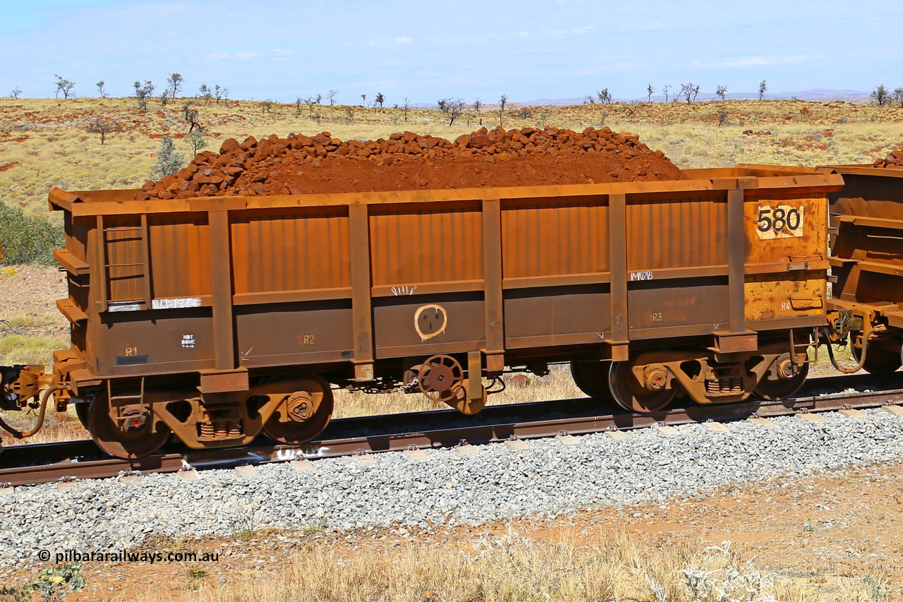 0580 170729 0195
Robe River ore waggon 580, built by Tomlinson Steel WA, fixed coupler handbrake side loaded view at the 103 km, between Maitland Siding and the Fortescue River on the Deepdale line. July 29, 2017.
Keywords: 580;Tomlinson-Steel-WA;Robe-ore-waggon;