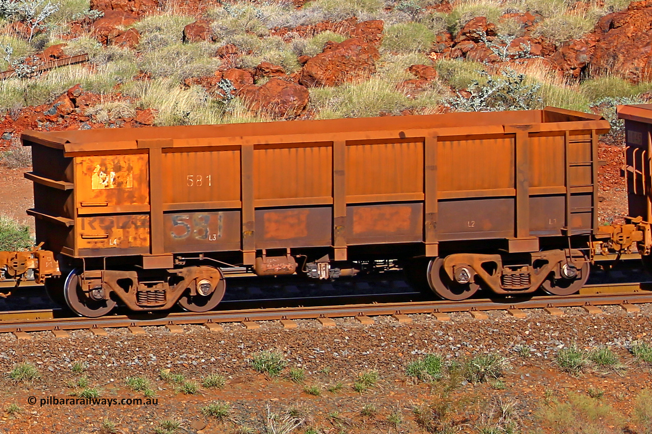 0581 180616 1714
Robe River ore waggon 581, built by Tomlinson Steel WA, rotary coupler end non-handbrake side empty view at the 38 km, Harding on the Cape Lambert line, June 16, 2018.
Keywords: 581;Tomlinson-Steel-WA;Robe-ore-waggon;