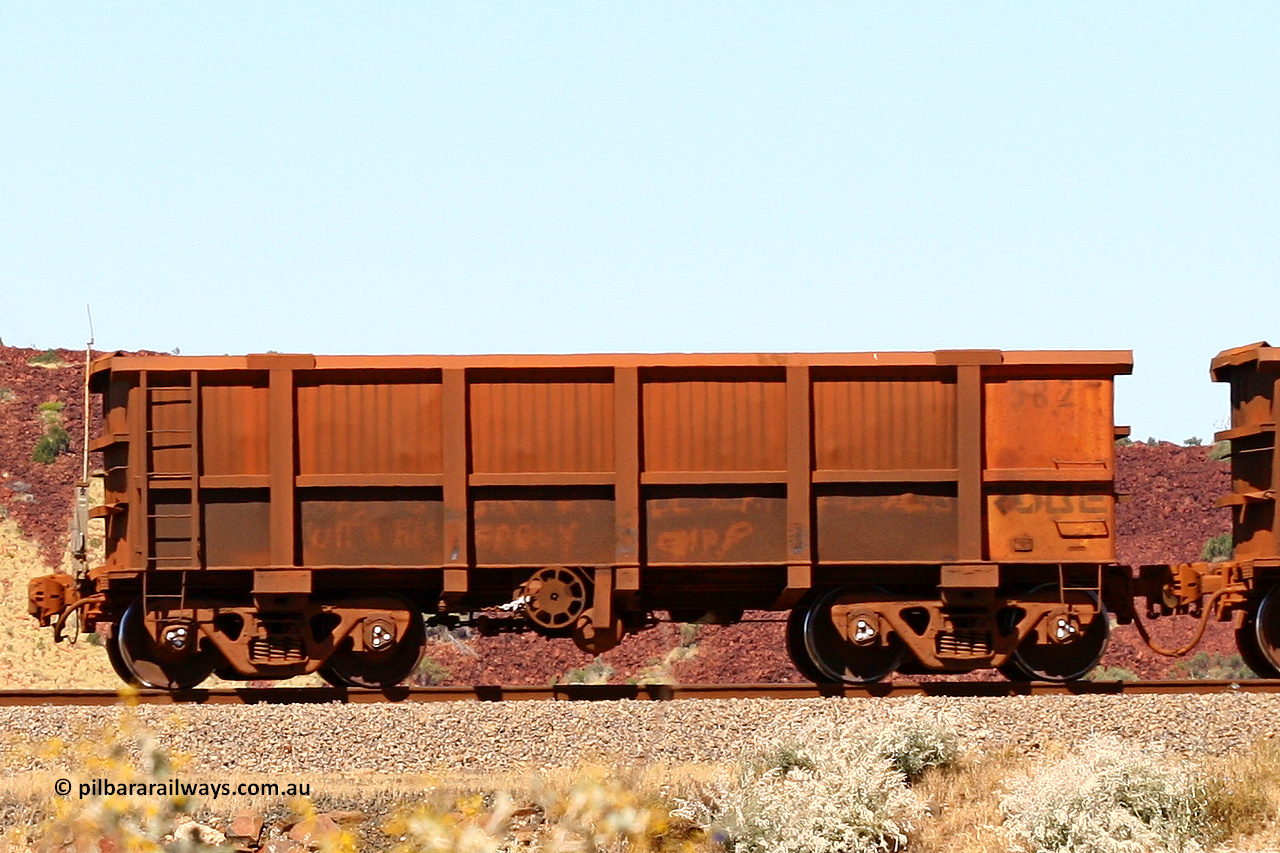 0582 060722 7449
Robe River ore waggon 582, built by Tomlinson Steel WA, handbrake side empty view at the 45.4 km just south of Harding Siding on the Cape Lambert line, end of train view. July 22, 2006.
Keywords: 582;Tomlinson-Steel-WA;Robe-ore-waggon;