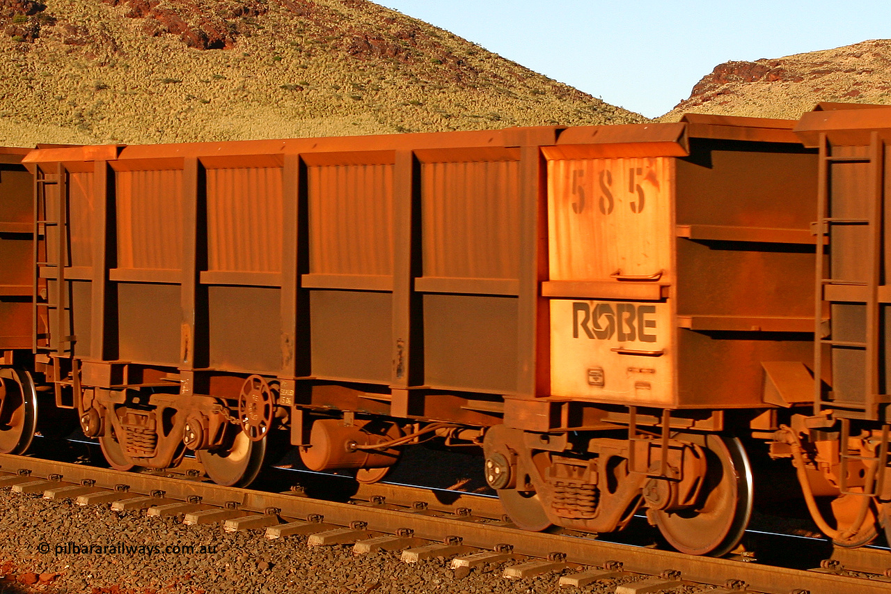 0585 060722 7612
Robe River ore waggon 585, built by Tomlinson Steel WA, rotary coupler end handbrake side empty view, at the 11.7 km, Cape Lambert. July 22, 2006.
Keywords: 585;Tomlinson-Steel-WA;Robe-ore-waggon;