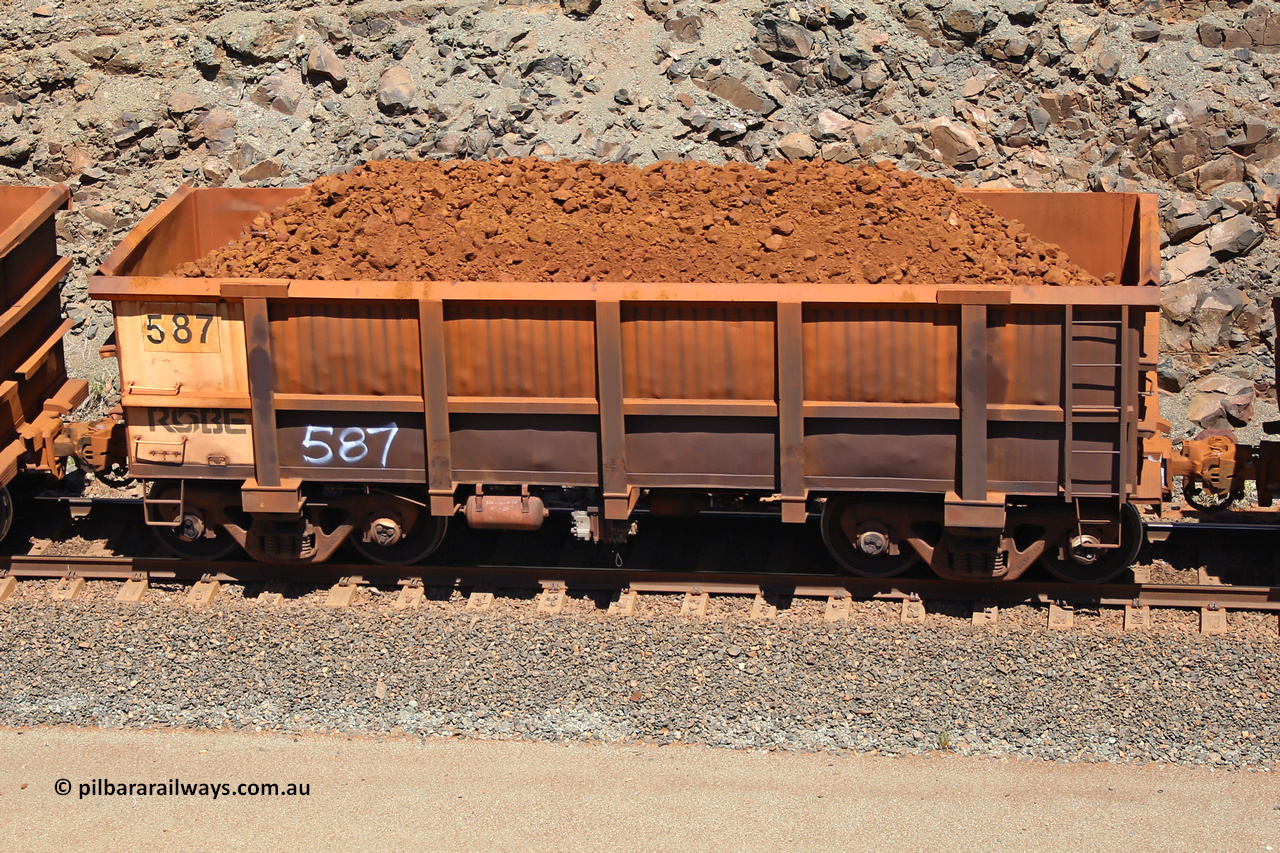 0587 160306 1522
Robe River ore waggon 587, built by Tomlinson Steel WA, fixed coupler non-handbrake side loaded view, at the 45 km, Harding Siding on the Cape Lambert line. March 6, 2016.
Keywords: 587;Tomlinson-Steel-WA;Robe-ore-waggon;