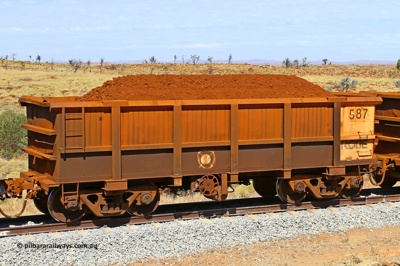 0587 170729 0249
Robe River ore waggon 587, built by Tomlinson Steel WA, fixed coupler handbrake side loaded view at the 103 km, between Maitland Siding and the Fortescue River on the Deepdale line. July 29, 2017.
Keywords: 587;Tomlinson-Steel-WA;Robe-ore-waggon;