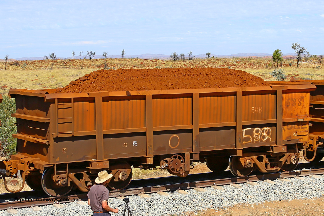 0588 170729 0269
Robe River ore waggon 588, built by Tomlinson Steel WA, fixed coupler handbrake side loaded view at the 103 km, between Maitland Siding and the Fortescue River on the Deepdale line. July 29, 2017.
Keywords: 588;Tomlinson-Steel-WA;Robe-ore-waggon;